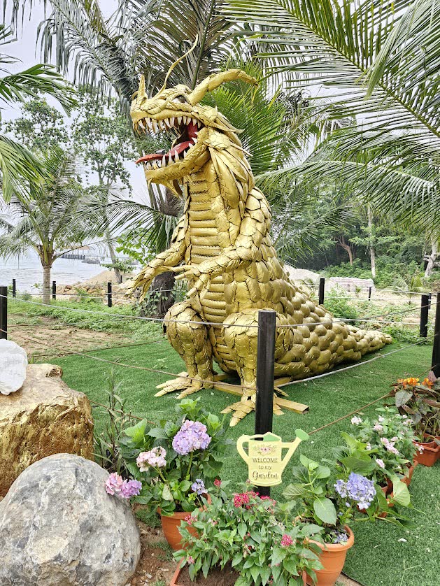 The golden dragon statue in the resort garden, Tioman Island