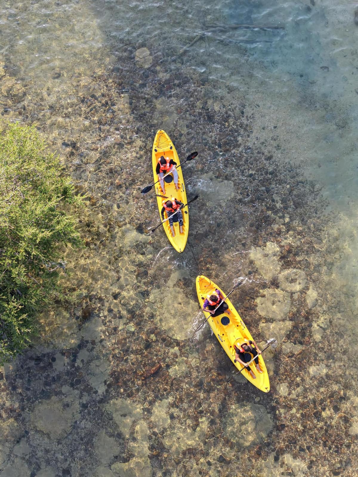 Aerial view of kayaks on Tioman Island coastline